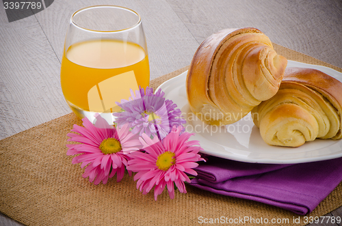 Image of Croissants with orange juice 