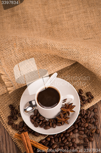 Image of Coffee cup with burlap sack