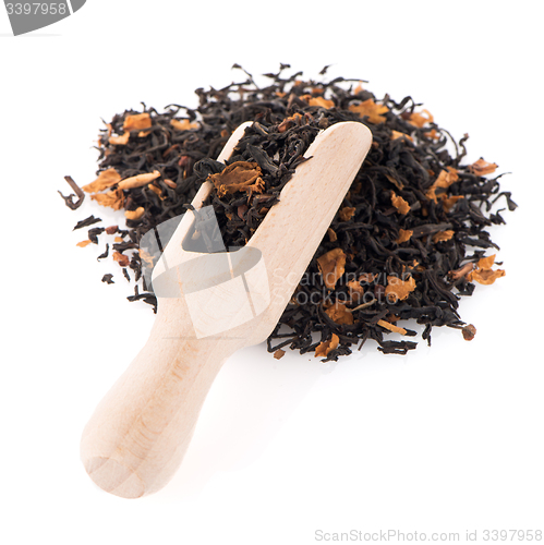 Image of Black Dry Tea with a Wooden Spoon