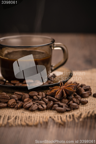 Image of Coffee cup with burlap sack