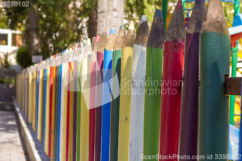 Image of Fence of colourful pencils