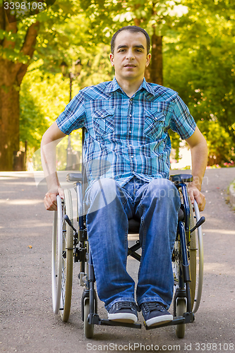 Image of young man in wheelchair