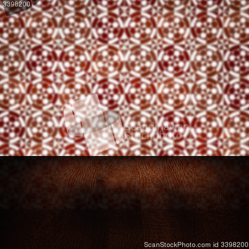 Image of Wood table top and blur vintage ceramic tile pattern wall