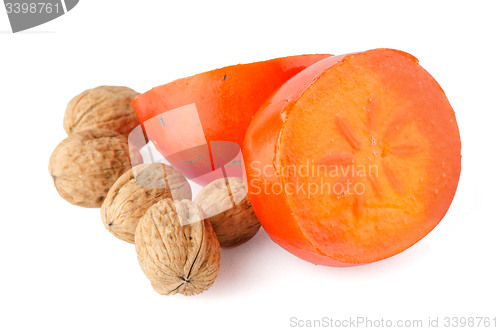 Image of Ripe persimmons and nuts