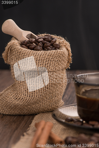 Image of Coffee cup with burlap sack