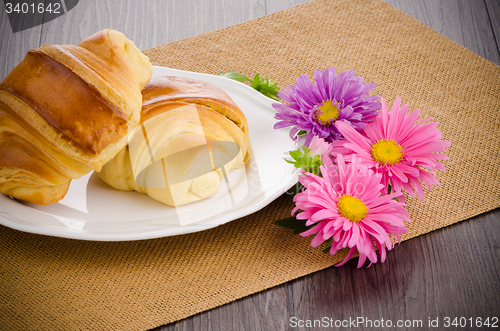 Image of Croissants with orange juice 