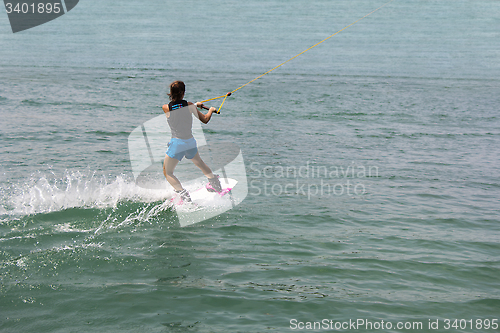 Image of Young girl wakeboarder