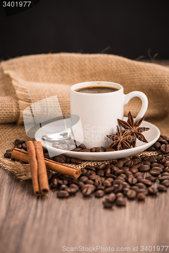 Image of Coffee cup with burlap sack