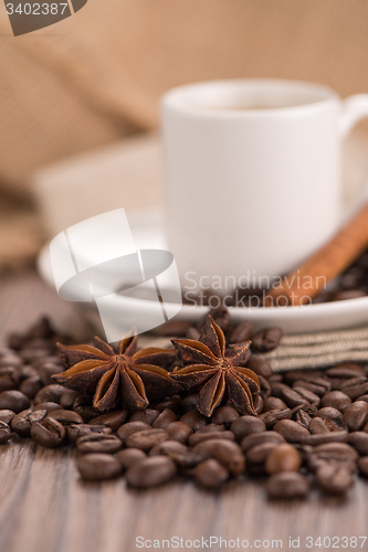 Image of Coffee cup with burlap sack