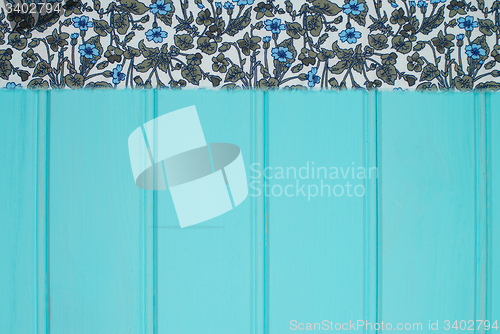 Image of Blue and white towel over table