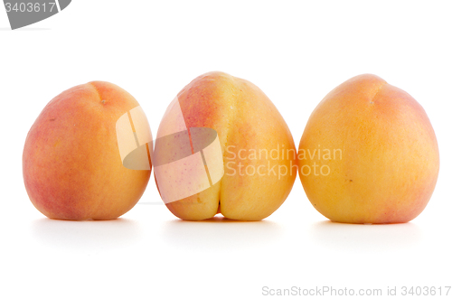 Image of Three sweet peaches
