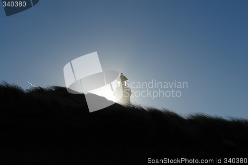 Image of Lighthouse, sun behind