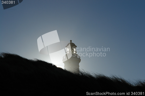 Image of Lighthouse, sun behind