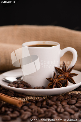 Image of Coffee cup with burlap sack