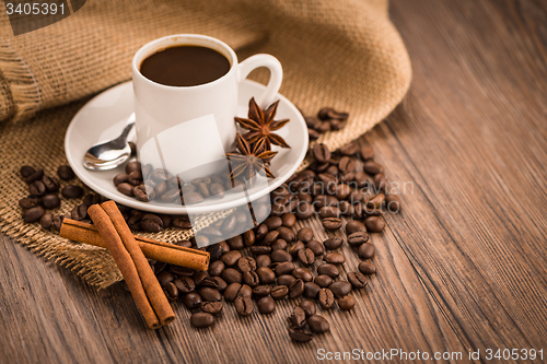 Image of Coffee cup with burlap sack