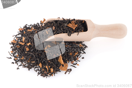 Image of Black Dry Tea with a Wooden Spoon