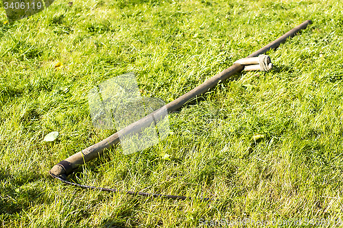 Image of Scythe is old agricultural tools for mowing grass