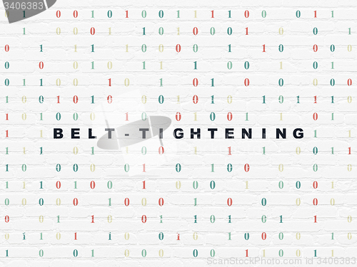 Image of Finance concept: Belt-tightening on wall background