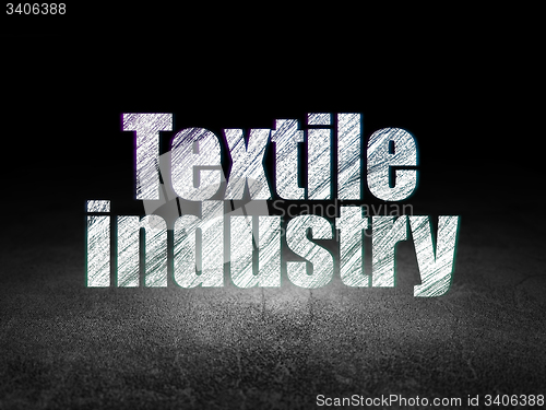 Image of Industry concept: Textile Industry in grunge dark room