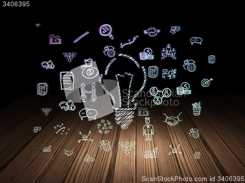 Image of Business concept: Light Bulb in grunge dark room