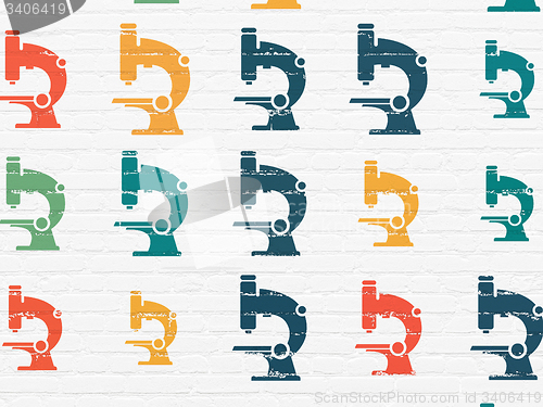 Image of Science concept: Microscope icons on wall background