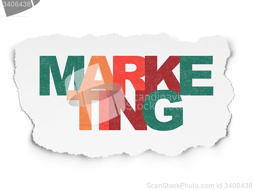 Image of Advertising concept: Marketing on Torn Paper background