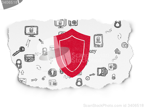 Image of Security concept: Shield on Torn Paper background