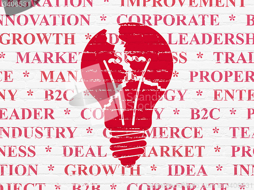 Image of Business concept: Light Bulb on wall background