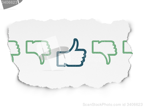 Image of Social network concept: thumb up icon on Torn Paper background