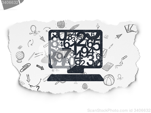 Image of Studying concept: Computer Pc on Torn Paper background