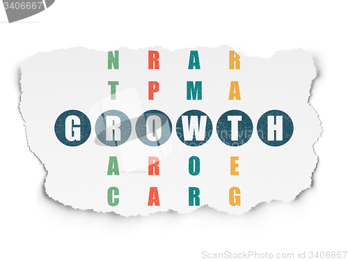 Image of Finance concept: word Growth in solving Crossword Puzzle