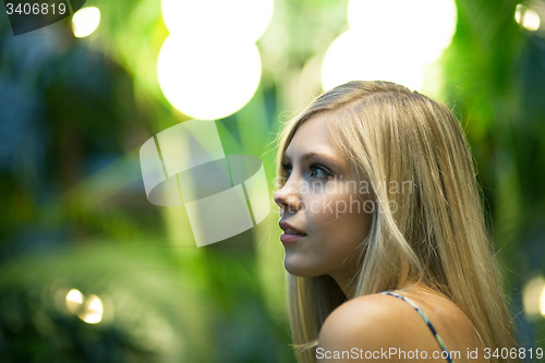 Image of Contemplative Blonde Woman