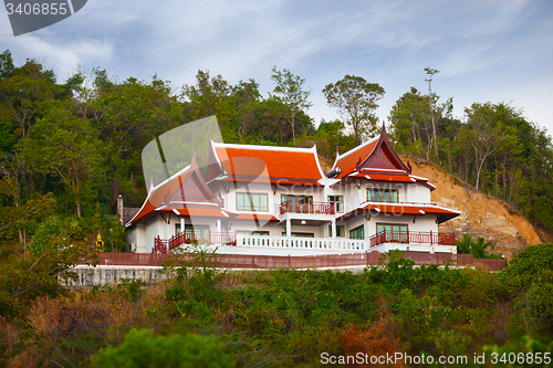 Image of Beautiful, ornate house with traditional, Asian architectural fe