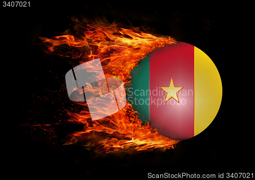 Image of Flag with a trail of fire - Cameroon