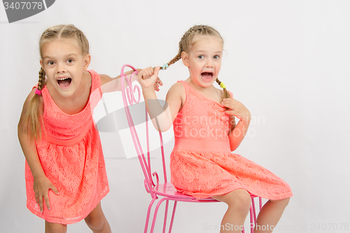 Image of Two girls having fun and shout