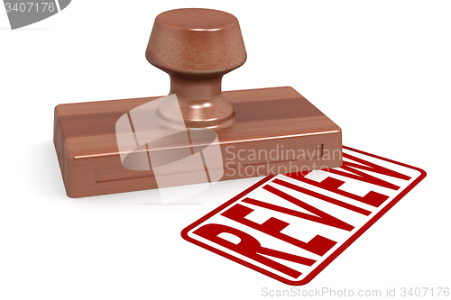 Image of Wooden stamp review with red text
