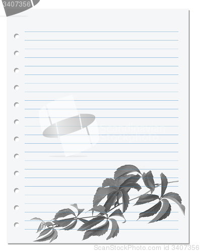 Image of Exercise book with autumnal virginia creeper twig