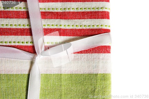 Image of Christmas fabric and ribbon.