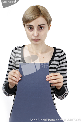 Image of Woman holding a paper