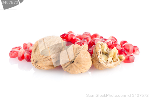 Image of Pomegranate seed pile and nuts