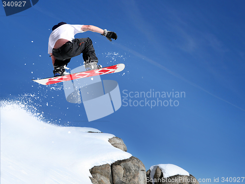 Image of Snowboarder jumping