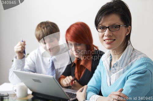 Image of beautiful caucasian business women with young consultant