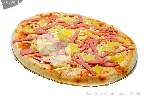 Image of Uncooked ham and pineapple pizza

