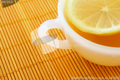Image of Teatime. Cup of tea with lemon