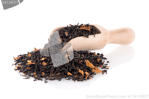 Image of Black Dry Tea with a Wooden Spoon