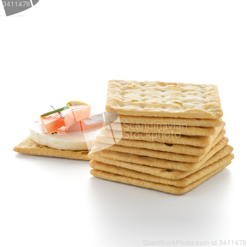 Image of Crackers with cheese and tomato
