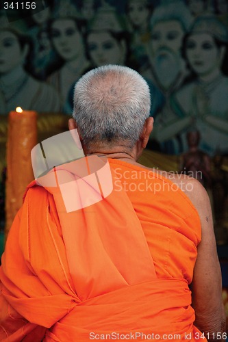 Image of buddhist monk pray