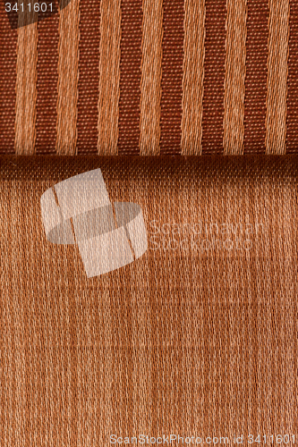 Image of Beige and orange fabric texture