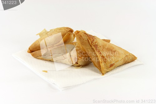 Image of cheese pies on napkin