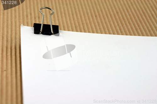 Image of paper with clip